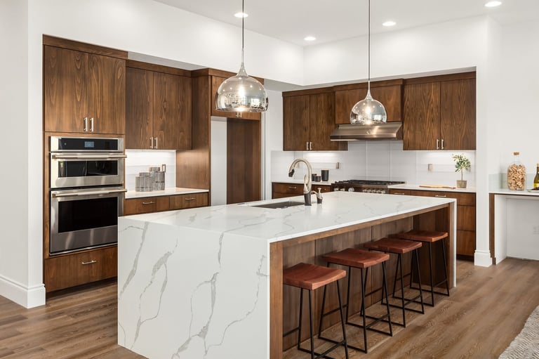 Luxury home kitchen with hardwood flooring and modern appliances