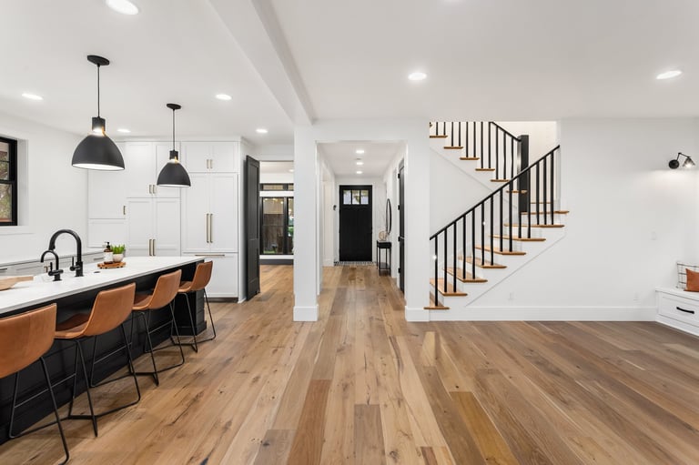 Kitchen in newly constructed luxury home with beautiful hardwood flooring