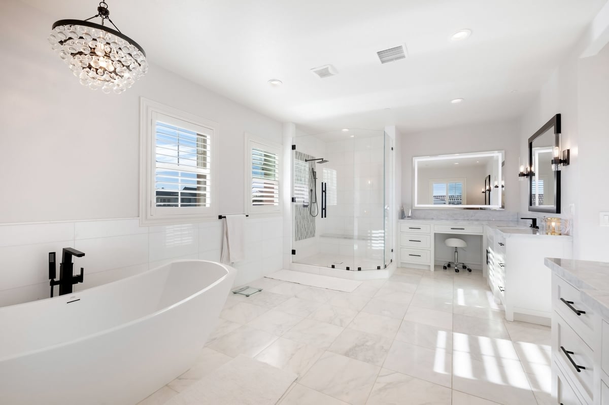 Bright and elegant bathroom with large windows in a luxury Chilliwack home