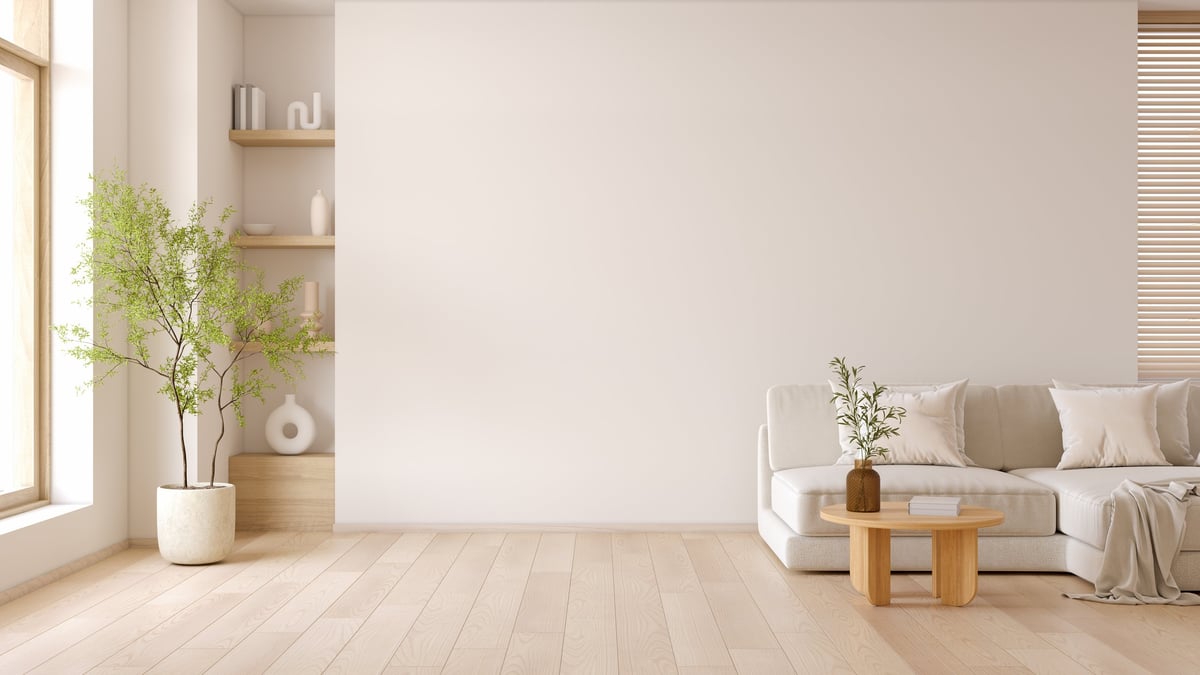 Minimal living room with modern sofa and coffee table with beautiful hardwood floor