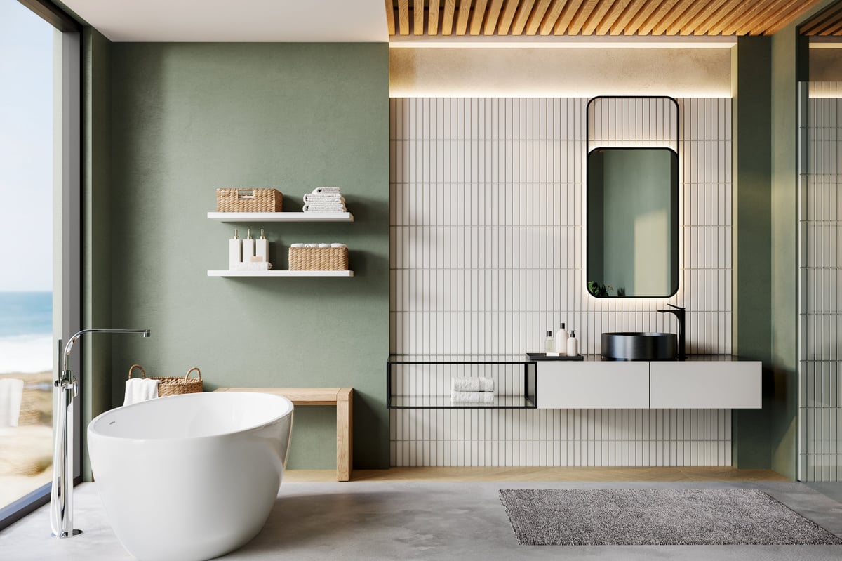 Modern minimalist bathroom interior with freestanding bathtub, vanity unit, and natural sunlight