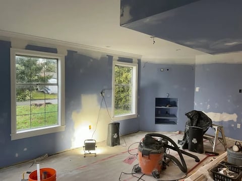 Chilliwack home renovation project featuring drywall finishing, windows with scenic views and professional construction tools on-site